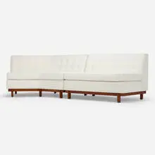 Sectional sofa by Frank Lloyd Wright, c. 1955, upholstery, mahogany, sold Aug 2023