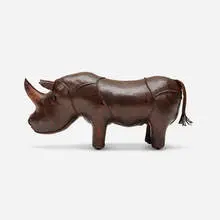 Rhinoceros ottoman by Omersa & Company, c. 1965, hand-stitched leather, sold Aug 2023