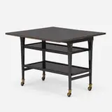 Tea cart by Chanaux & Co., c. 1935, lacquered wood, brass, casters, sold Aug 2023