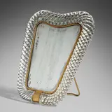Table mirror by Ercole Barovier, c. 1940, glass, mirrored glass, brass, sold Jul 2023