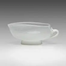 Mezza Filigrana bowl, model 705 by Tomaso Buzzi, c. 1933, glass with white filigree and applied lattimo details, sold Jul 2023