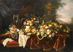 A still life of fruit, lobster and vessels on a table and a landscape beyond; also a companion painting (a pair) by Continental School, sold Sep 2014