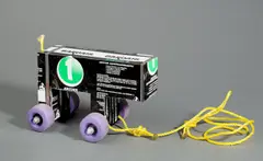 Ghetto Collector by Francis Alÿs, 2003, Metall, farbig bedruckt, Plastikrollen, Nylonschnur, Magneten, sold Oct 2022