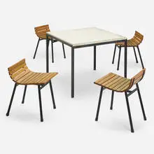 Dining set by California Modern, c. 1950, enameled steel, travertine, ash, rubber, sold Jun 2023