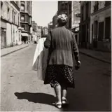 Paris 1950 (Woman walking on a road) by Louis Stettner, Silver Gelatin, offered Feb 2026