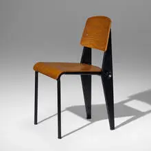 Demountable 'Semi-Metal' chair No. 300 by Jean Prouvé, c. 1952, lacquered steel, ash plywood, rubber, sold Jun 2023