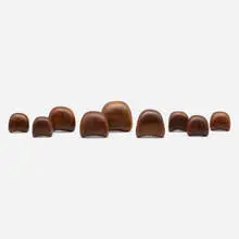 What-A-Knot-Boxes, collection of nine by Dean Santner, c. 1975, walnut, sold Jun 2023