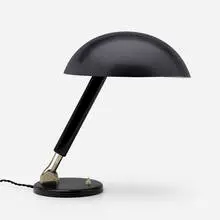 Table lamp by Karl Trabert, 1933, enameled aluminum, nickel-plated brass, lacquered wood, sold Jun 2023