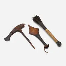 Collection of three weapons by Oceanic, carved and stained wood, jute, rattan, woven sea-grass, bone inlay, sold Jun 2023