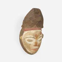 Mukudj mask by Punu artist, carved and painted wood, sold Jun 2023