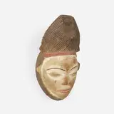 Mukudj mask by Punu artist, carved and painted wood, sold Jun 2023