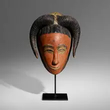 Gu mask by Guro artist, carved and painted wood, sold Jun 2023