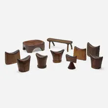 Collection of headrests by East African, carved wood, sold Jun 2023