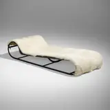 Chaise lounge for the Paris World's Fair by Jean Royere, c. 1936, painted steel, hide upholstery, burlap, sold Jun 2023