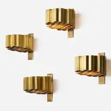 Honeycomb sconces, set of four by Jules Wabbes, c. 1953, bronze, brass-plated steel, sold Jun 2023