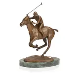 Polo player modelled on horseback, mid-swing with painted polo ball, with ochre patina, raised on an oval marble base with plaque, signed 'D.R. Rus', 25cm high (9 1/2in high). by D. Rene Rushing, offered Nov 2014