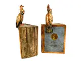 Untitled by Pompeian, bronze co. cockatoo atlas bookends, sold May 2026