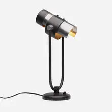 Desk lamp by Serge Mouille, c. 1962, enameled steel, aluminum, plastic, sold Jun 2023