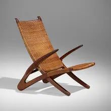 Rare Dolphin lounge chair by Hans J. Wegner, 1950, oak, cane, brass, sold Jun 2023