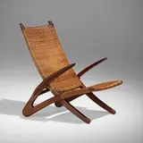 Rare Dolphin lounge chair by Hans J. Wegner, 1950, oak, cane, brass, sold Jun 2023