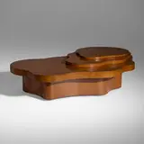 Rare and Important Mesa table by T. H. Robsjohn-Gibbings, 1952, walnut, casters, sold Jun 2023