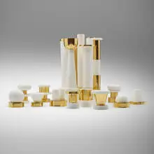 Centerpiece by Ettore Sottsass, 1996, 24k gold, bisque porcelain, sold Jun 2023