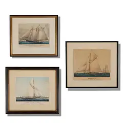 A collection of three (3) Currier & Ives lithographs from the personal collection of John Mecray. i. "The Yacht "Dauntless" of N.Y. 268 Tons." by Currier & Ives, Lithograph. Currier & Ives, offered Aug 2026