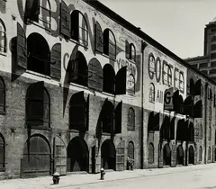 Yuban Coffee Warehouse, Water and Dock Streets, Brooklyn by Berenice Abbott, 1936, Gelatin silver print, sold Aug 2024