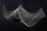 Untitled (Spiral) by John Bisbee, 1999, Welded nails, sold Aug 2024