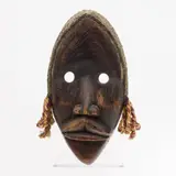 Dan, Liberia, c. 1970's by African Female Circumcision Mask, carved wood masked with twisted rope hair. A ceremonial mask, offered Jun 2025