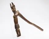 Probably African by Carved Wood Figure, carved wood standing figure with handle at back, sold Feb 2025