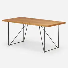 Desk by Luther Conover, c. 1955, mahogany, iron, sold Jun 2023