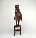 Untitled by Juan Clara, bronze sculpture of a young girl on a stool, offered Aug 2025