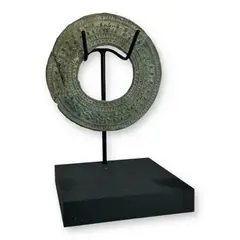 Untitled by Roman, bronze votive hand mirror – round form, ca. 1st–3rd century a.d., offered Jun 2025