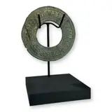 Untitled by Roman, bronze votive hand mirror – round form, ca. 1st–3rd century a.d., offered Jun 2025