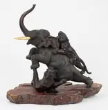 Elephant and Tigers by Genryusai Seiya, bronze okimono and live edge carved wooden base. Sculpture:, offered Feb 2025