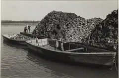 Loading the Barge, Kiawah River by Jack Leigh, Silver Gelatin, sold Jun 2024