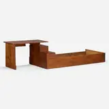 Early bed with desk from the artist's cabin, Bearsville, New York by Paul Theodore Frankl, c. 1925, stained pine, sold Jun 2023