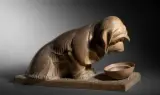 Chien et son écuelle by Raymonde Guerbe, Terre cuite patinée, sold Oct 2026