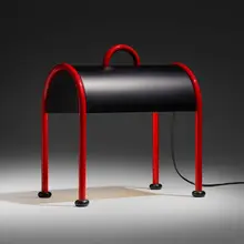 Valiglia table lamp by Ettore Sottsass, 1977, enameled metal, sold May 2023