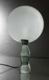 & Mattia BONETTI (né en 1952) & EN ATTENDANT LES BARBARES (éditeur) Lampe de table La Lune, modèle créé en 1984 by Elisabeth Garouste, Épreuve en bronze à patine verte et cache-ampoule circulaire en dalle de verre dépoli, sold Jun 2026