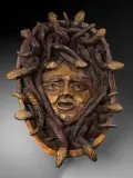Méduse by Jean Marais, Épreuve en bronze à patine dorée nuancée à décor en semi-relief, sold Jun 2026