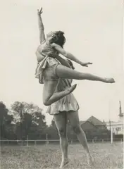 Jeunes gymnastes, le porté, c. 1930 by Henri Manuel, Tirage argentique d’époque, rehaut de gouache sur l’image, sold Sep 2026
