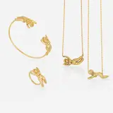Stout Girl jewelry collection by Katie Stout and Simone Paasche, c. 2020, gold-plated silver, sold May 2023