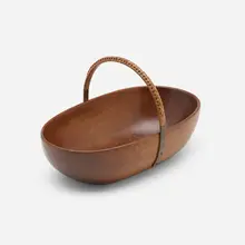 Nut bowl, model A-436 by Carl Auböck, 1955, walnut, brass, cane, sold May 2023