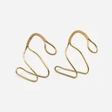 Bottle holders model 3601, pair by Carl Auböck, 1946, brass, cane, sold May 2023