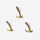 Coat hangers model 4056, set of three by Carl Auböck, c. 1950, brass, sold May 2023