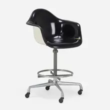 EC118 drafting stool by Charles and Ray Eames, c. 1968, molded fiberglass, Naugahyde, cast aluminum, enameled steel, chrome-plated steel, sold May 2023