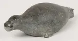 Seal by Inuit Carved Seal, Carved soapstone. An Inuit disc number (a forced human numbering system imposed, offered Jun 2023