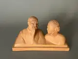 Couple de Chinois by Gaston Hauchecorne, Épreuve en terre cuite à base rectangulaire, sold Nov 2025